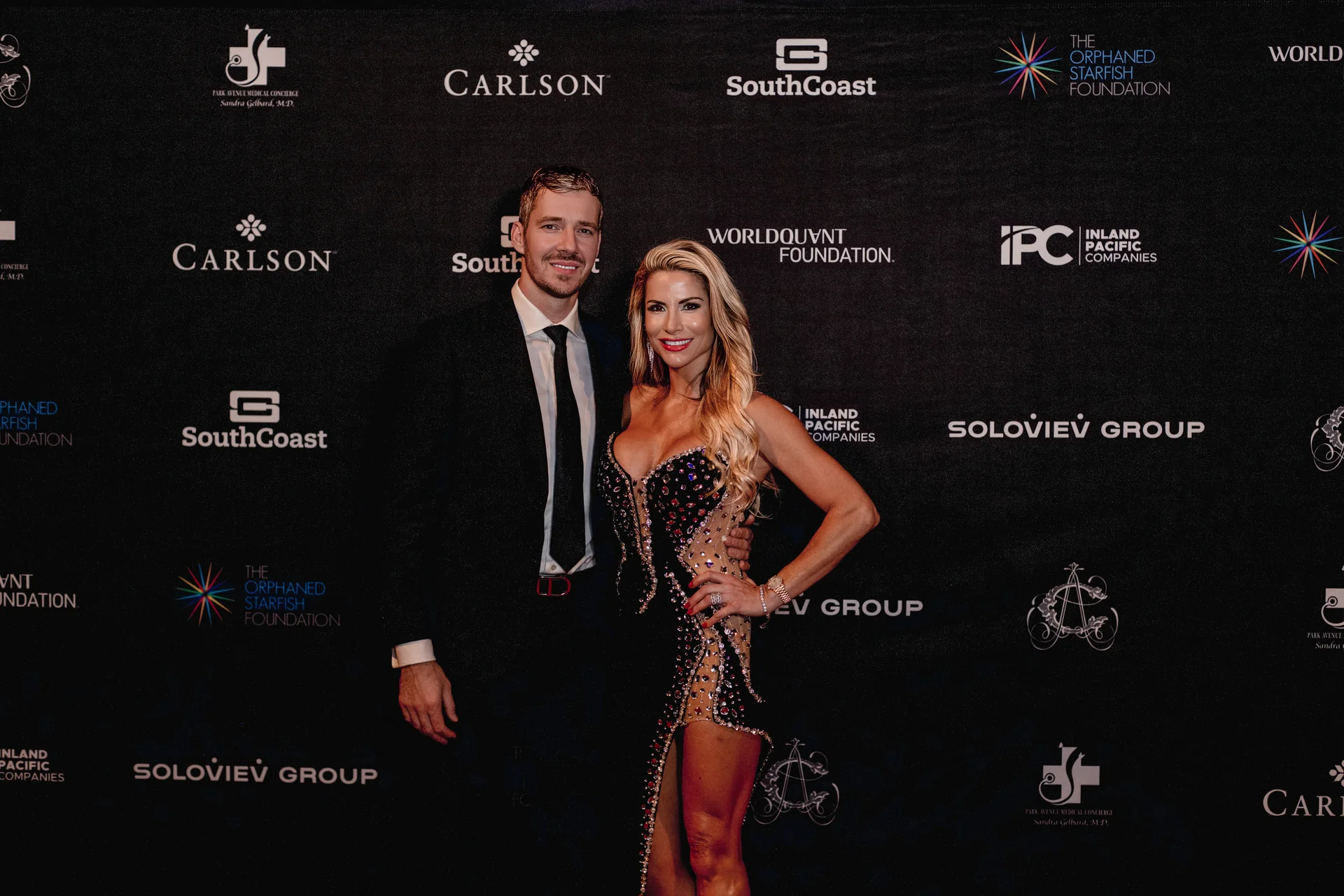 Guests posing together at the Orphan Starfish Foundation gala